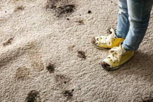 Little,Girl,In,Muddy,Shoes,Messing,Up,Carpet,At,Home